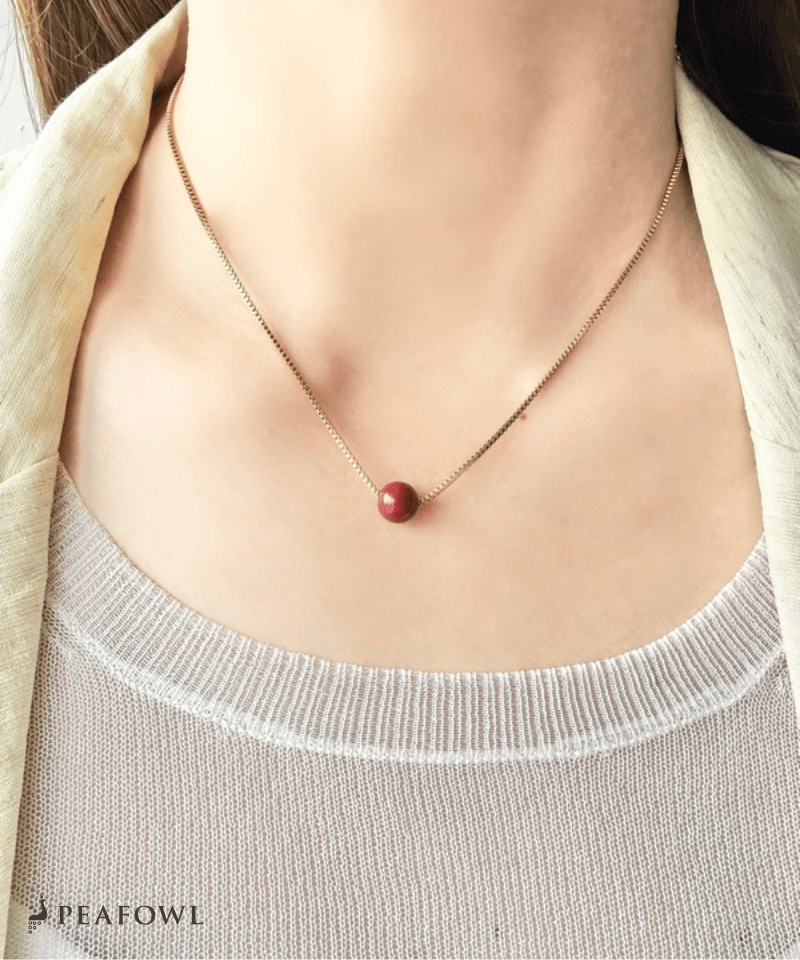 Red Ball Necklace - peafowl