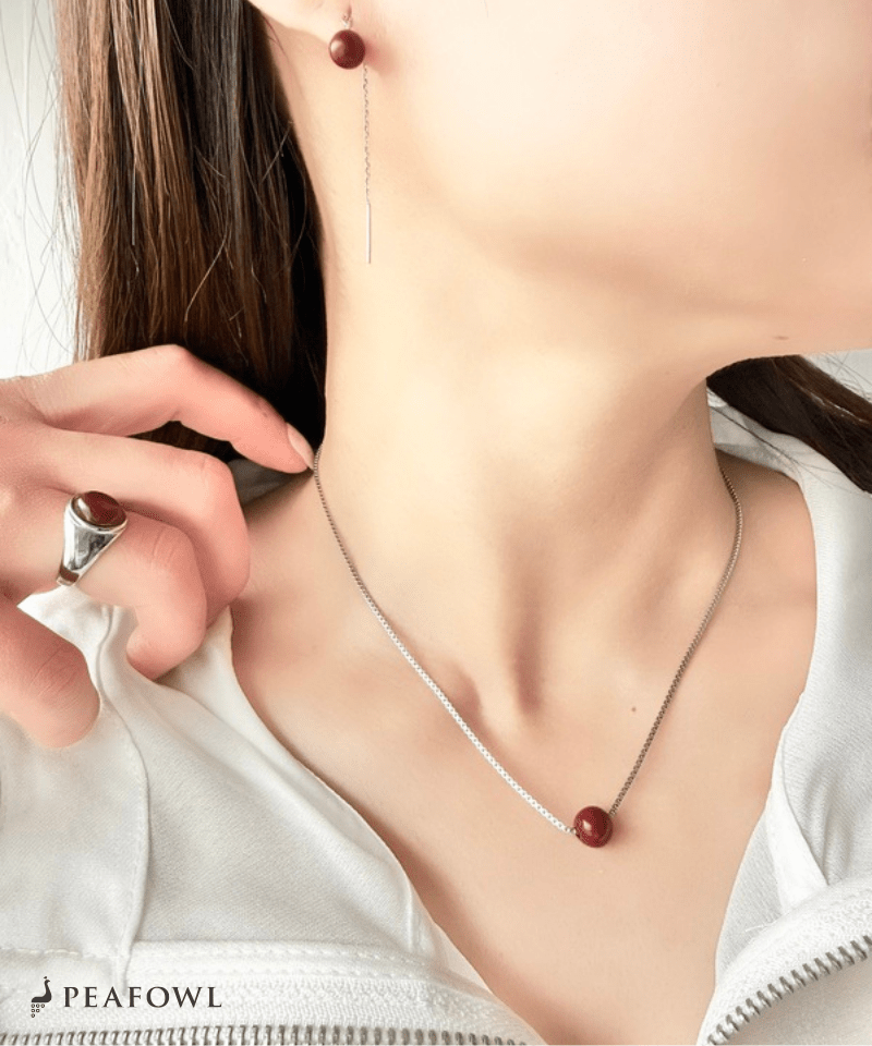 Red Ball Necklace - peafowl