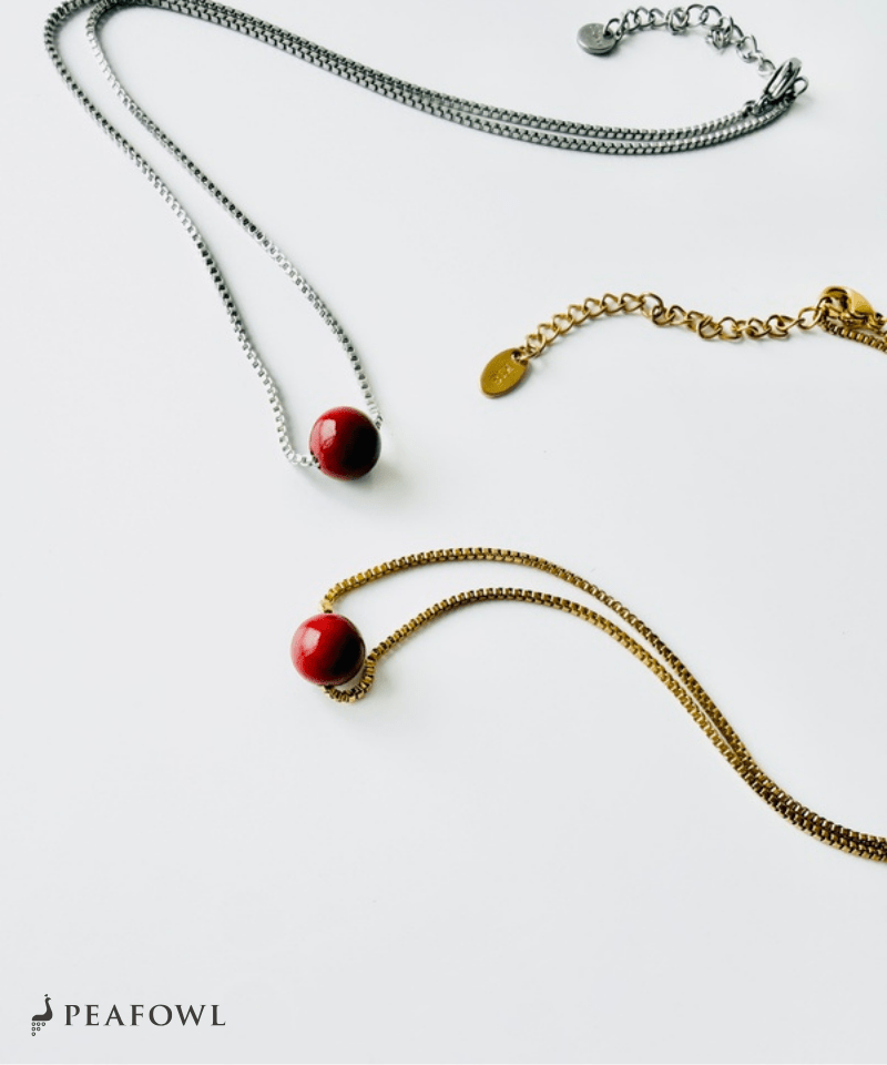 Red Ball Necklace - peafowl
