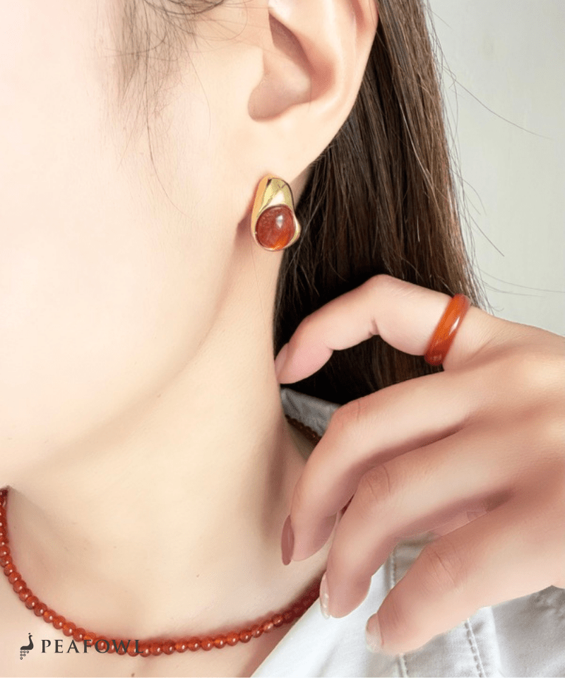 Nuance Oval Pierce - peafowl