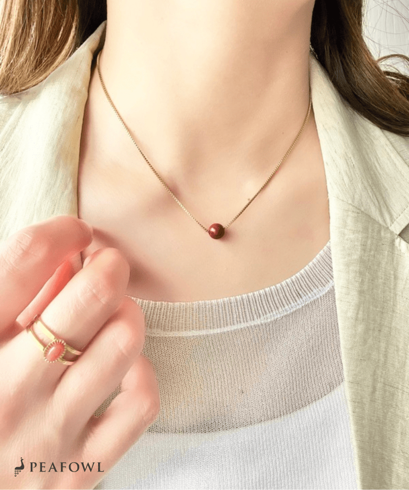 Red Ball Necklace - peafowl