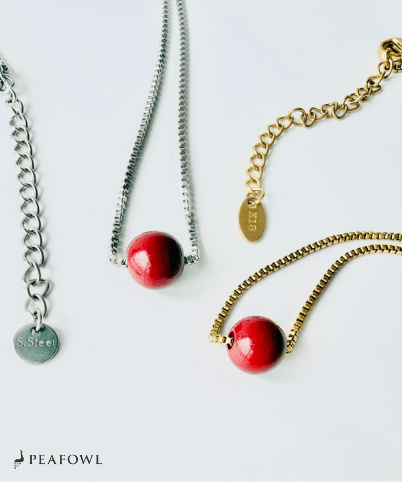 Red Ball Necklace - peafowl