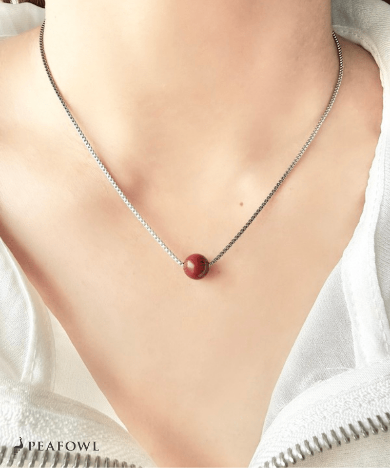 Red Ball Necklace - peafowl