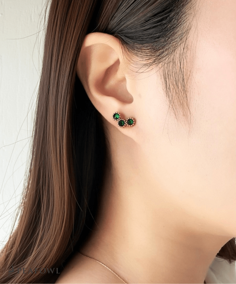 Triple Stone Pierce - peafowl