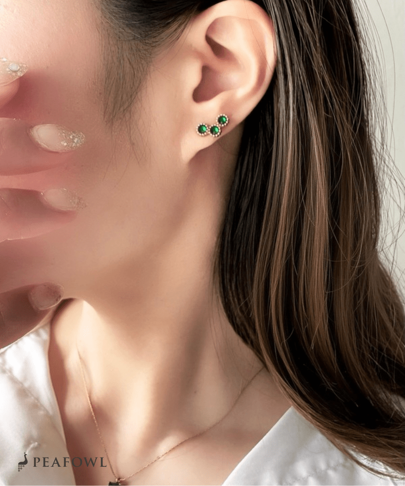 Triple Stone Pierce - peafowl